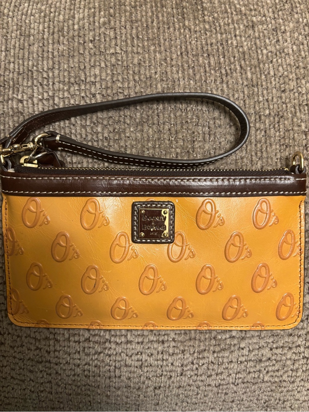 Dooney & Bourke Orange Embossed Leather Wristlet with Brown Trim